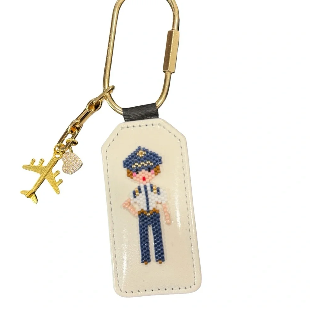 Hand Crafted Beaded Female Pilot Keychain with Gold Charms